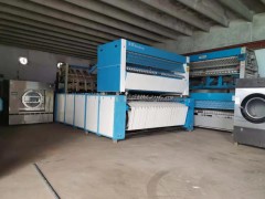 葫蘆島低價轉讓二手5棍百強燙平機9成新，二手脫水機100公斤
